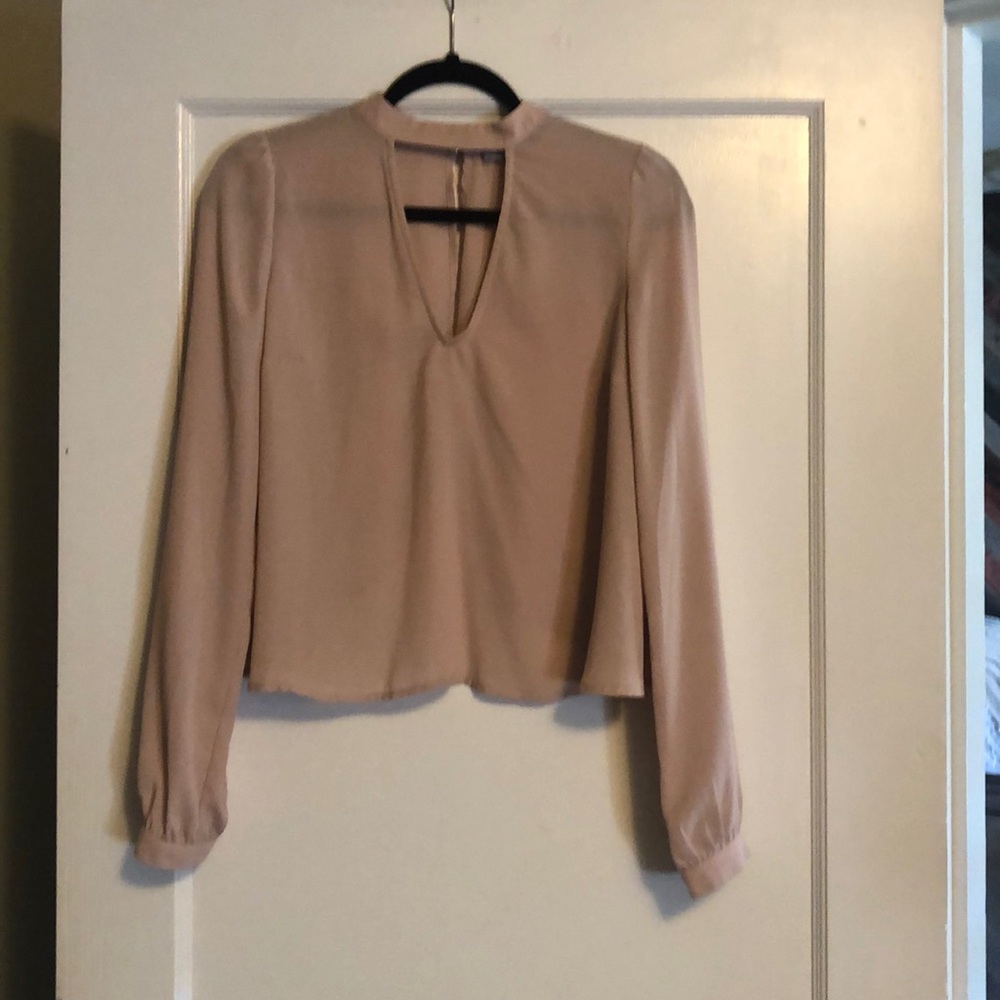 light pink open-back blouse